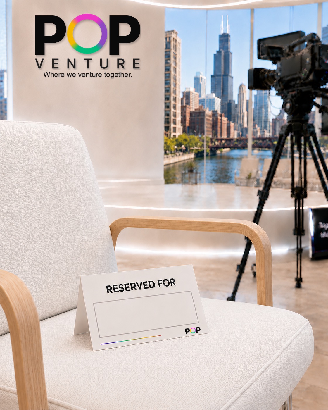 A bright Pop Venture studio chair with a Reserved For card, ready for a Venturer.
